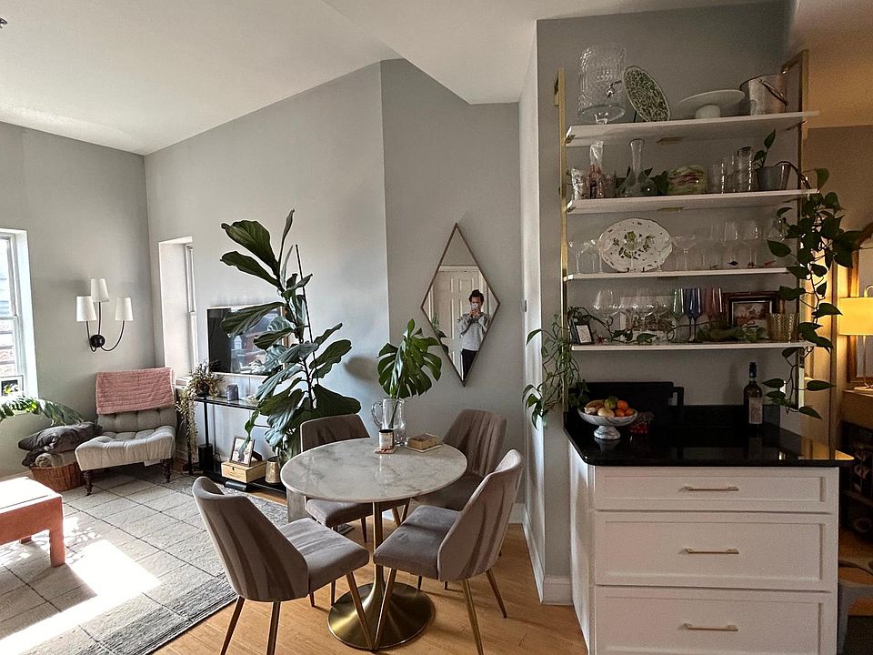 living room, dining nook, open shelving and great kitchen storage drawers.