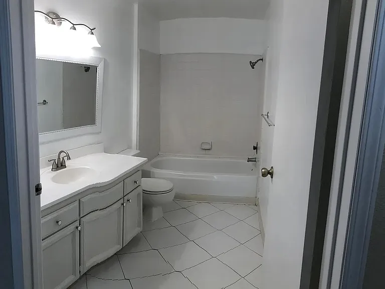 Newly decorated full bathroom with shower and tub. Landlady will pay for new shower curtain of your choice.
