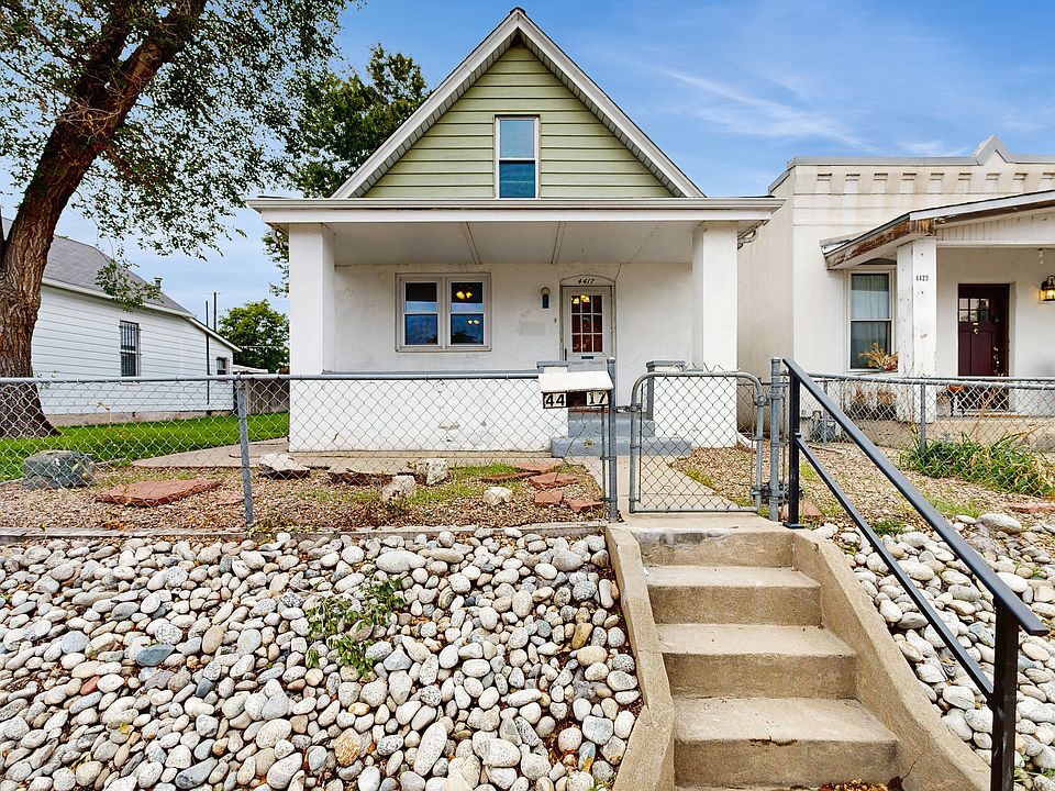 Street Entrance with Handrail and Established Grass Side Yard to Private Concrete Patio