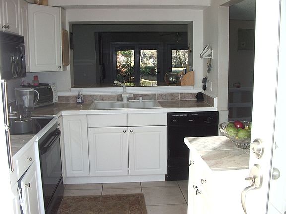 Renovated kitchen with stone countertops