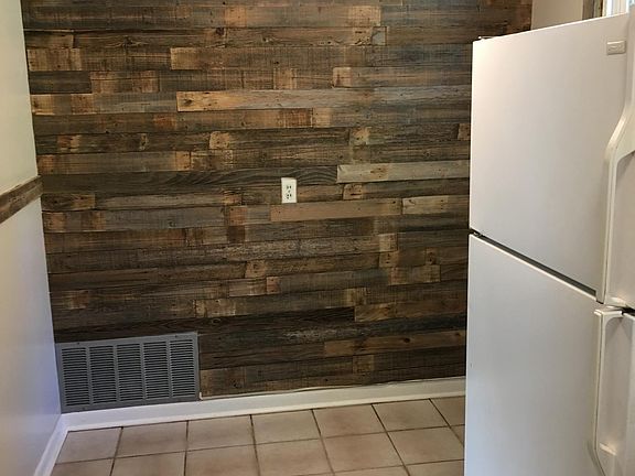 Rustic wood wall in kitchen