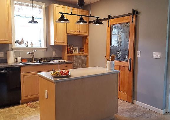 Kitchen with pantry door