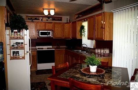 With doors to deck and back yard