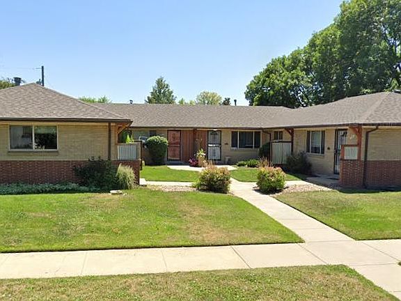 Front View. There are 4 units and this house is back left corner. One large window opens to front area.