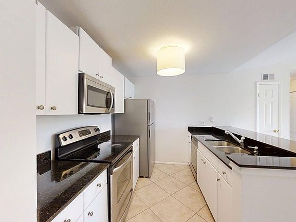 2nd image of 1885 Palm Cove Boulevard #10-307