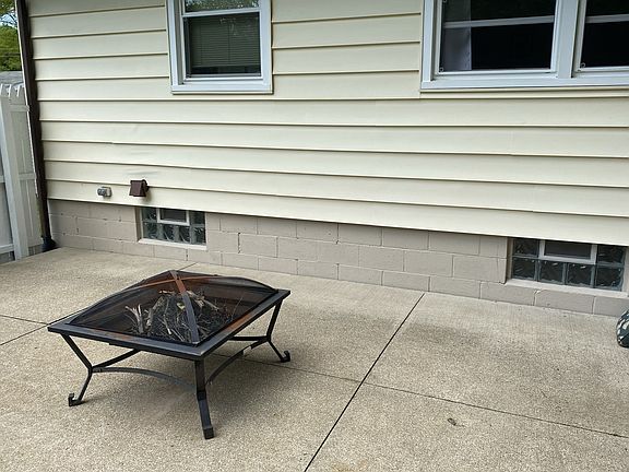 Patio area with privacy fence