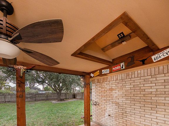 Large patio area, 2 ceiling fans, tv connection with a big yard.. great for family!