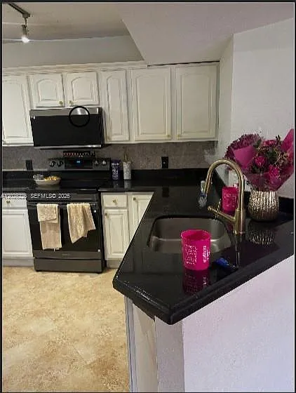 8761 Wiles Rd #301 — Photo 3