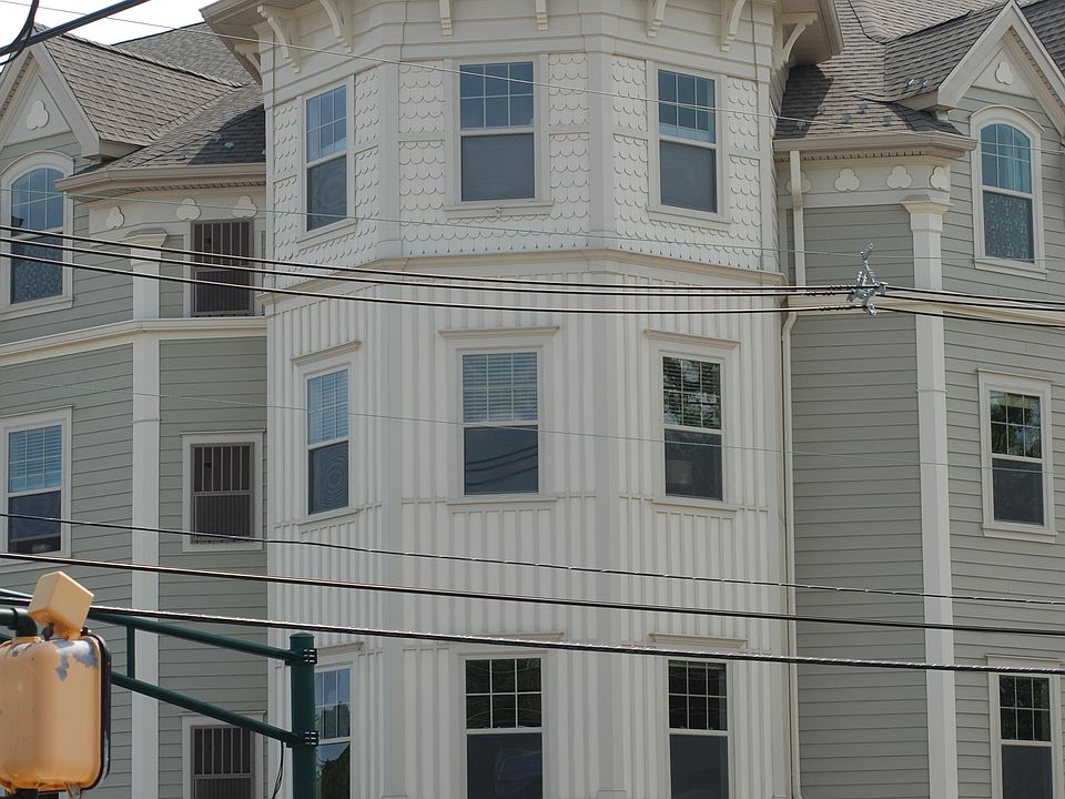 Corner building across from the train station,