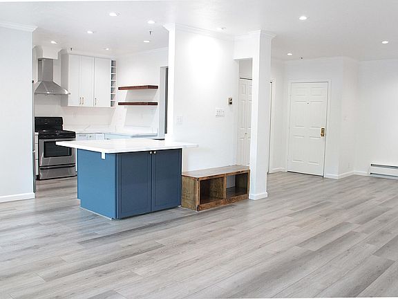 Large Living/Dining Room with open kitchen/counter