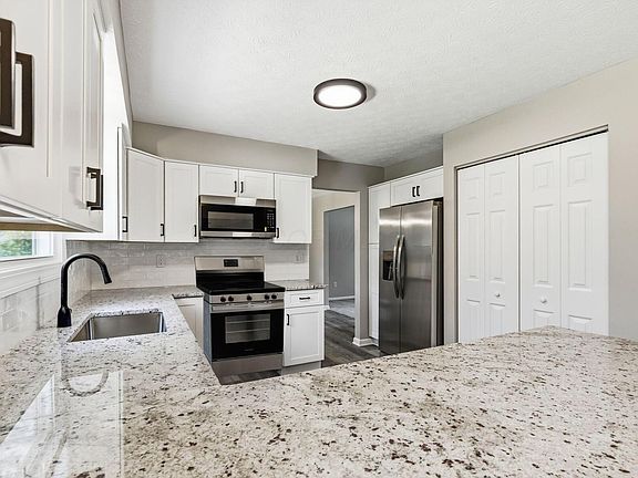 5th image of 6998 Nocturne Rd N