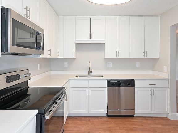 An open kitchen makes it easier to entertain guests, even when you're busy cooking!