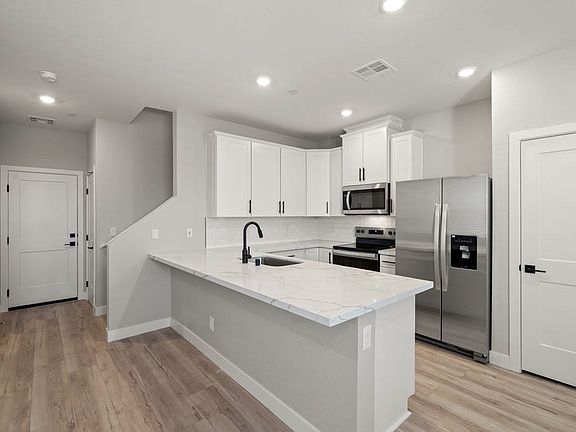 Each kitchen comes with stainless-steel appliances included.