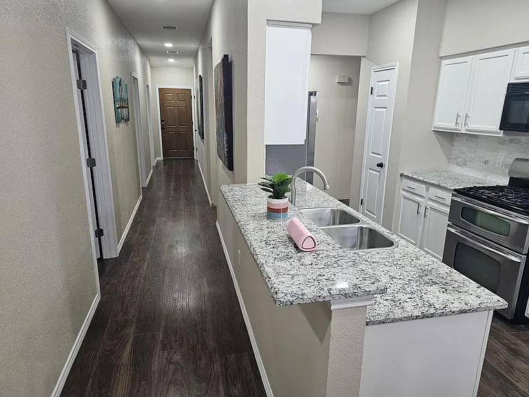 Entryway next to kitchen
