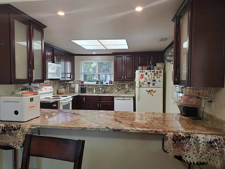 View of kitchen from dining area