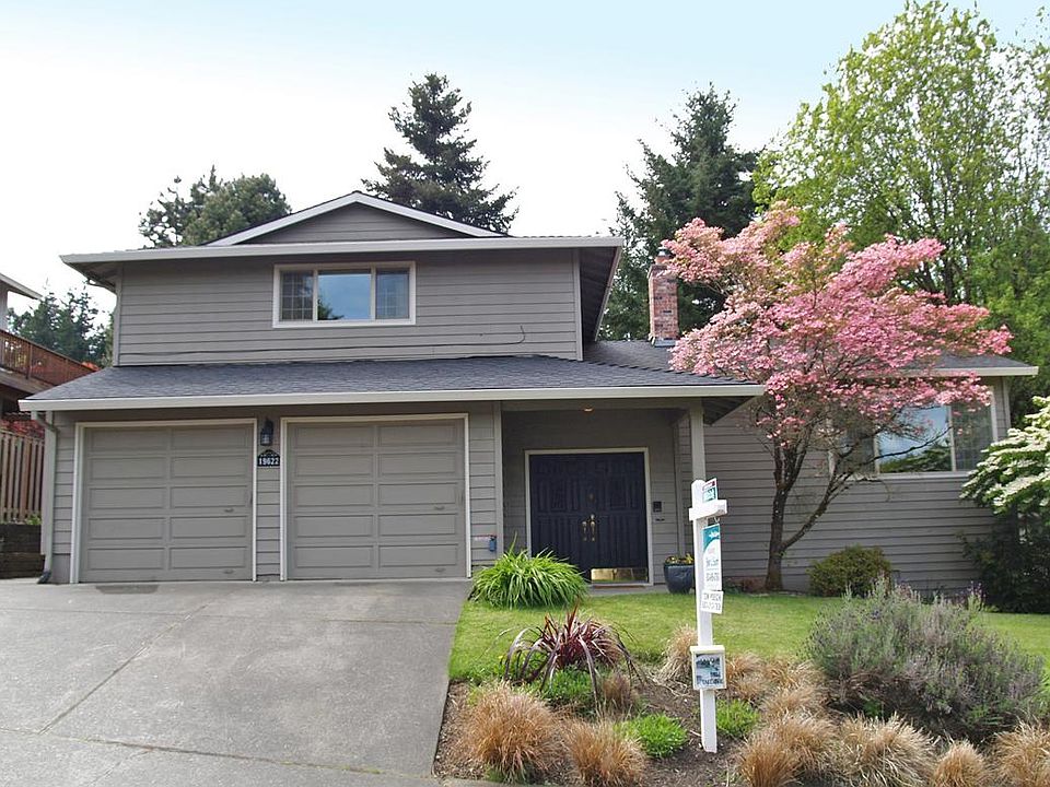 front elevation, rv parking to left of home