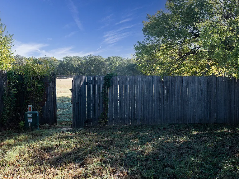 Gate in back yard to park