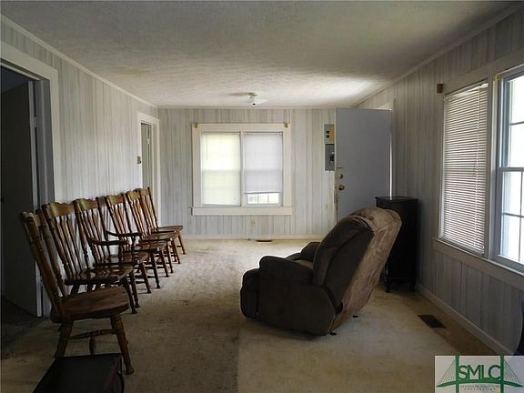 Large living room. There are two bedrooms to rear of LR.
