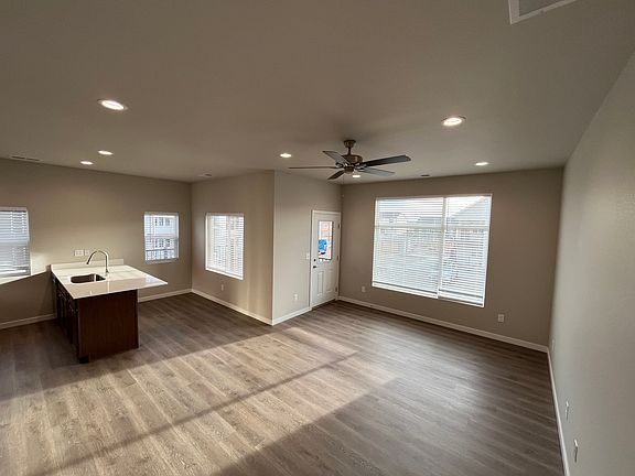 Living/room kitchen view from entrance. Private Wifi throughout apartment and Cat 6 Connections in main rooms.