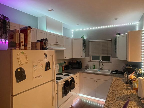 This is a Picture of the Kitchen, with LED Lighting, that can change color according to your preference