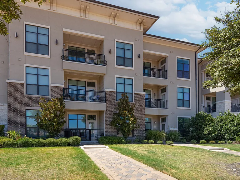 Elegant Exterior and Landscaping at The Hendry Apartments