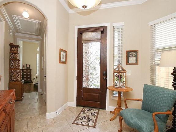 Tile and wood floors throughout. No Carpet in this home