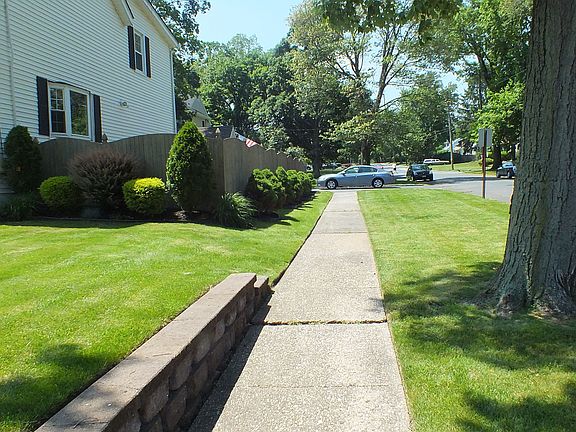 SIDEWALK AT SIDE OF HOUSE