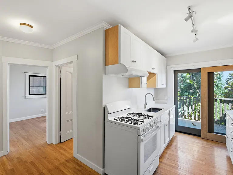 kitchen and view back to room and closet