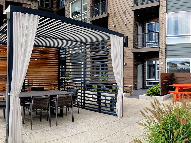 Third Floor Courtyard with Grilling Space and Multiple Seating Areas