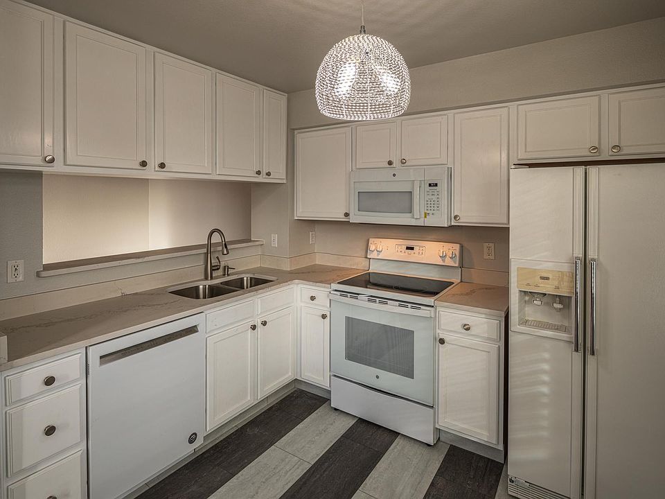 Kitchen with new quartz counter tops and new appliances