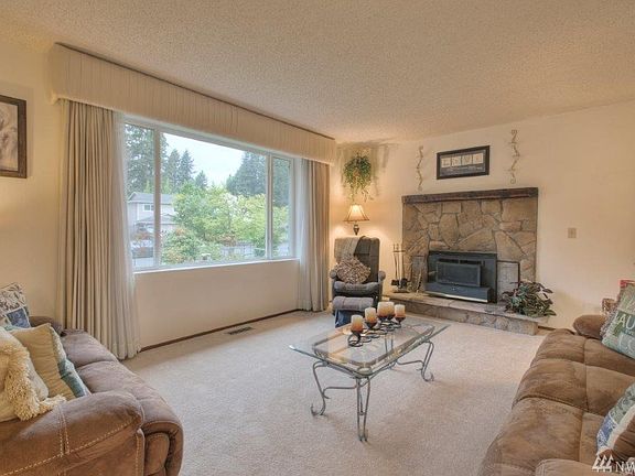 Living Room on main level off front door entrance. New carpet.
