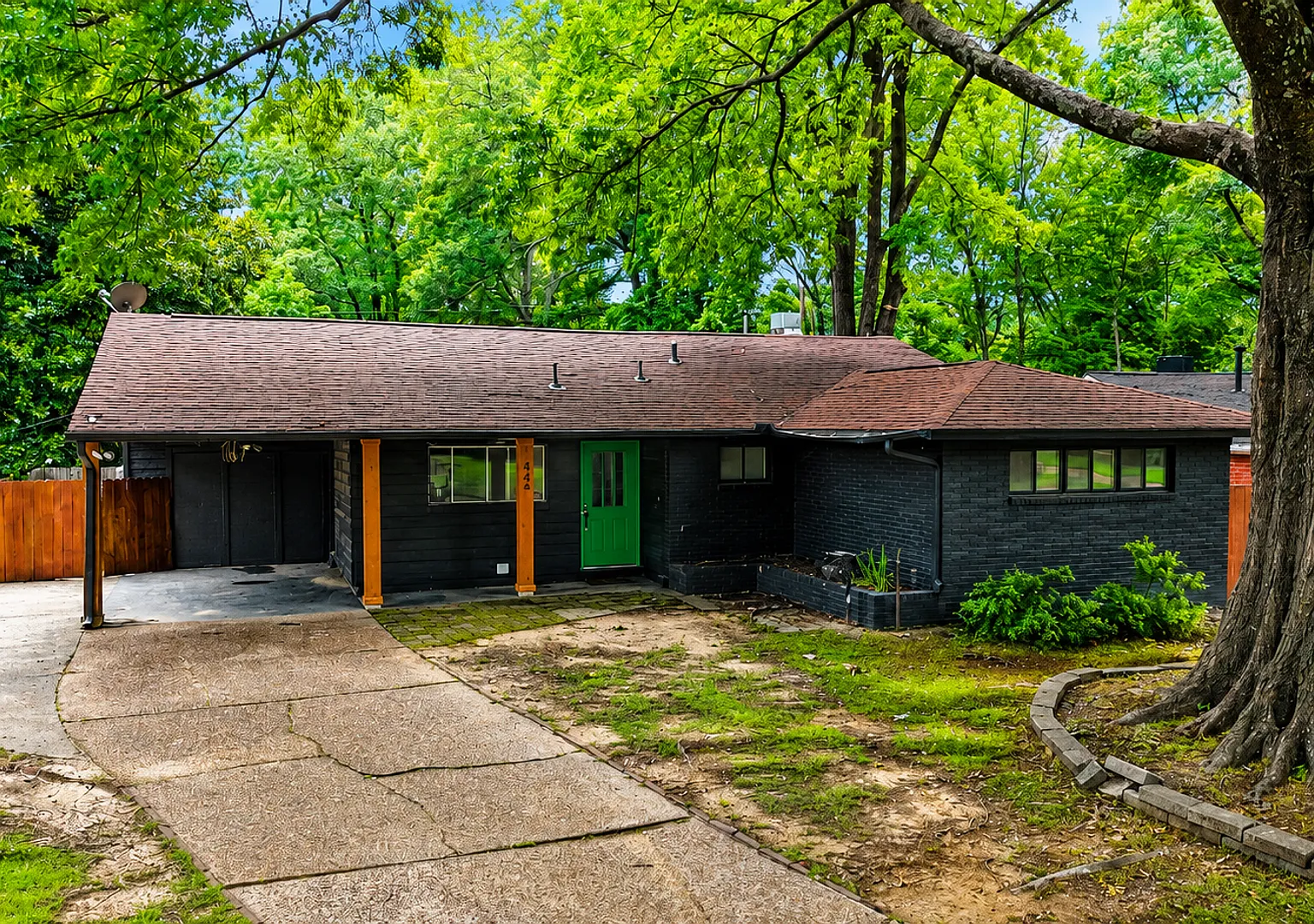 Cozy Freshly Updated 4BR/2BA on Green Acres- Available Now — Photo 2