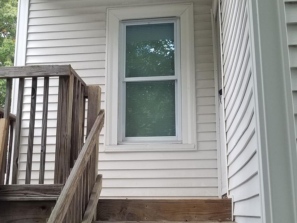 back entrance with small porch