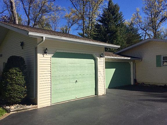 the third garage holds a 20 foot pontoon