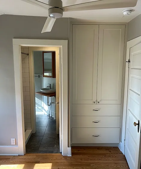 door from bedroom to bath with built in closet
