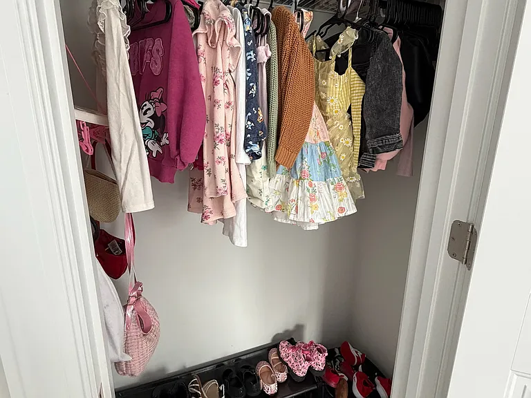 One of two twin closets for bedroom number two