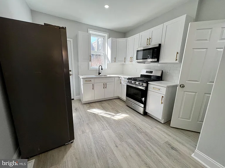 5744 Delancey St — Photo 4
