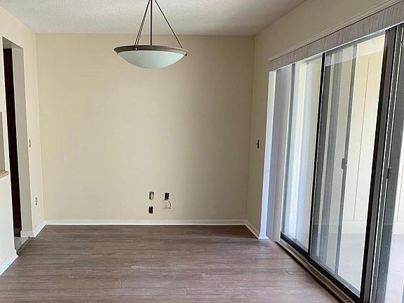 dining room with west-facing balcony