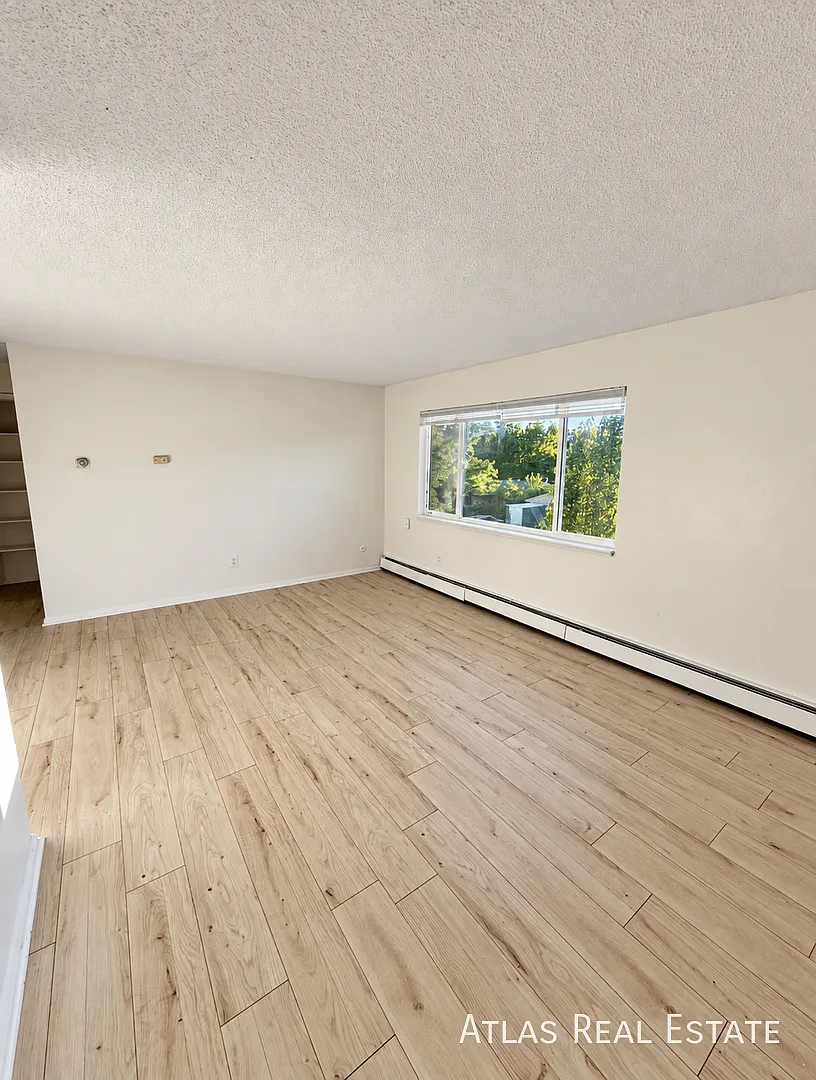 One Month Free! 3-Bedroom with In-Unit Laundry & Utilities Included — Photo 4