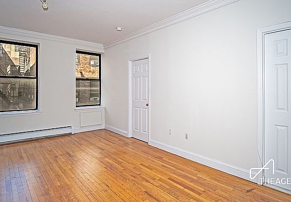 3rd image of 235 E 13th St APT 3F