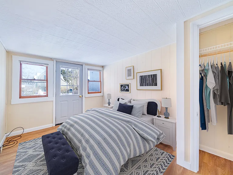 Den or Bedroom 4 (main floor) - digitally staged