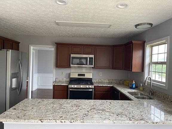 Kitchen with granite countertop