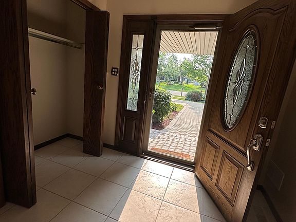 front entrance with coat closet