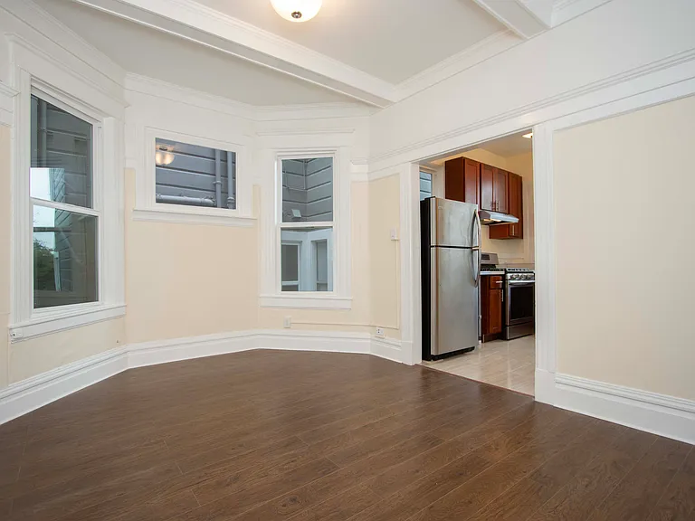 View of Living Room and Kitchen as you enter from the Hallway