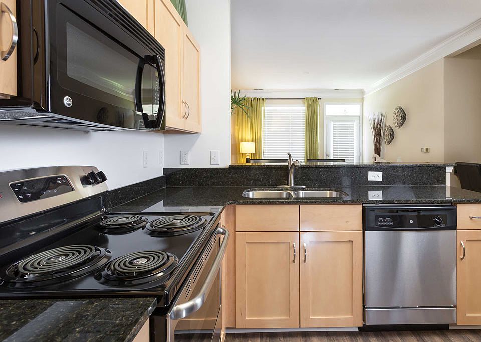 Kitchen with granate counter-tops