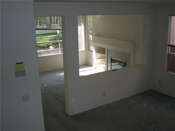 View from stairs to first floor. For sale at 560K.