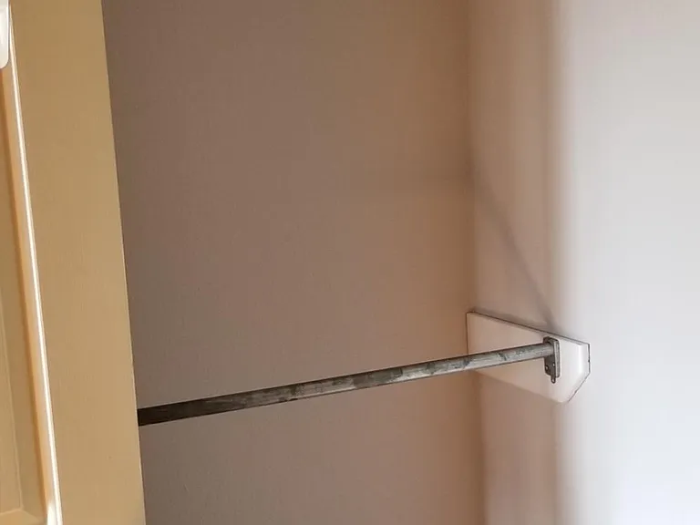 walk-through closet, from office to master bathroom.