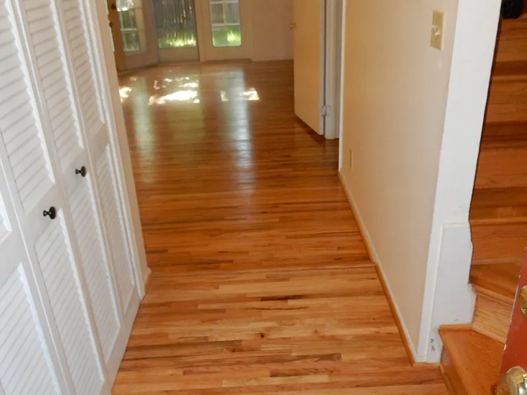 Entry way. Stairs leading to three bedrooms upstairs