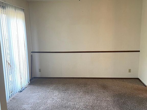 Dining room with patio door to deck.