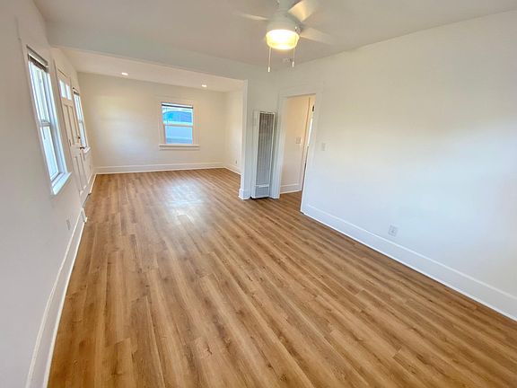 Common space - living/dining room. The doorway leads into the kitchen
